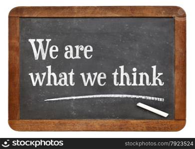 We are what we think - philosophical words on a vintage slate blackboard
