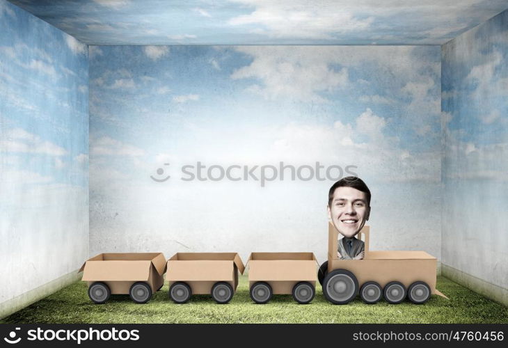 We deliver fast. Funny image of businessman riding in carton train