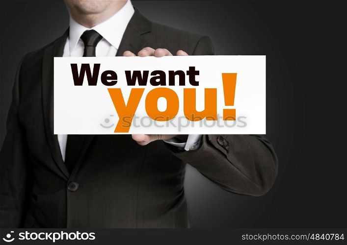 We want you; sign is held by businessman concept. We want you; sign is held by businessman concept.