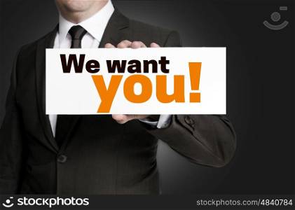 We want you; sign is held by businessman concept. We want you; sign is held by businessman concept.