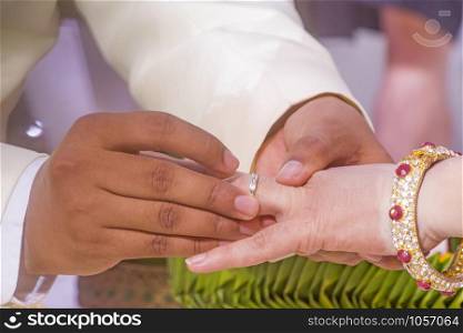 Wear a ring in thai wedding ceremony