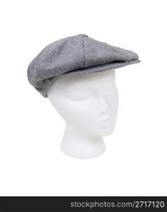 Wearing a masculine tweed flat driving cap worn on the head when out for a drive - path included
