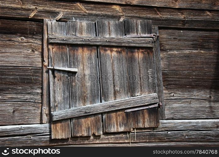 Weathered barn door at a farmhouse in the village Stensjo. From the swedish province Smaland.