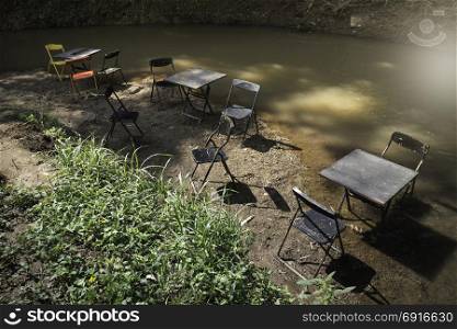 Weathered old outdoors table and chairs set, stock photo