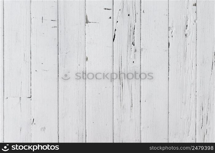 Weathered white painted wooden table from boards texture background