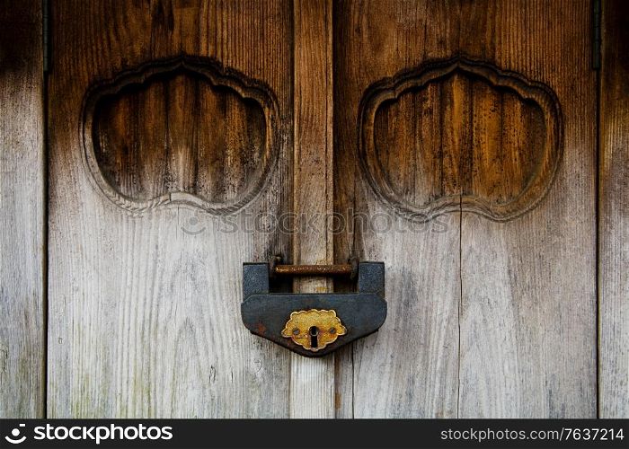 Weathered Wood Door and Old Lock. Japanese Diary