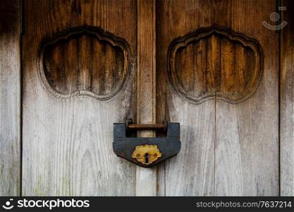 Weathered Wood Door and Old Lock. Japanese Diary