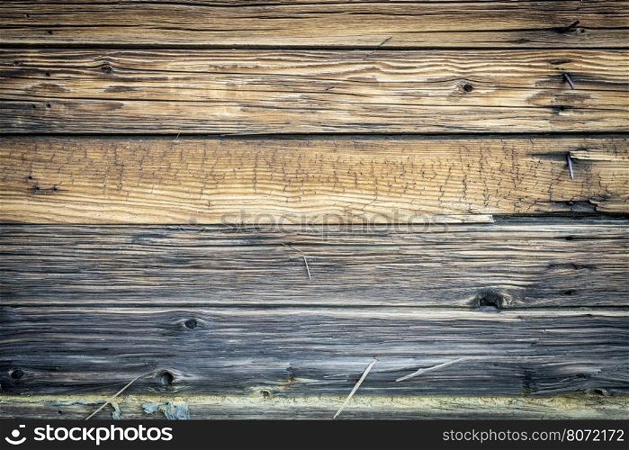 weathered wood texture of a rustic cabin wall
