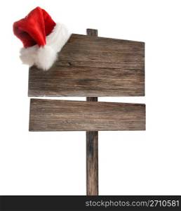 Weathered wooden sign with santa hat on white