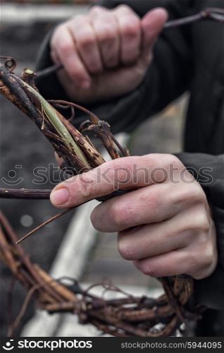 Weaving wreath of vines