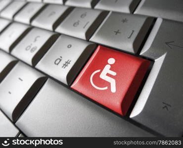 Web content accessibility concept with wheelchair icon and symbol on a red computer key for blog and online business.