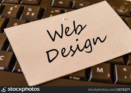 Web Design Concept on black keyboard