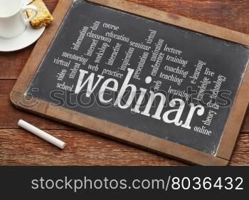 webinar (web seminar) and online education word cloud on a vintage slate blackboard against rustic wood