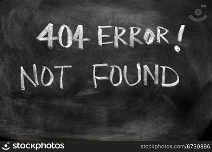Webpage 404 error of not found written on blackboard