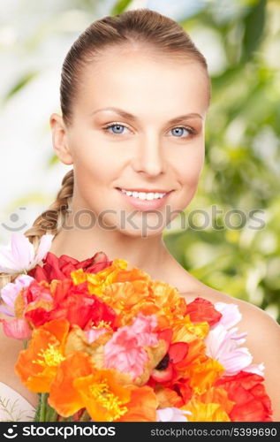 wedding and beauty concept - young woman with bouquet of flowers