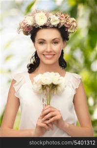 wedding and beauty concept - young woman with flower