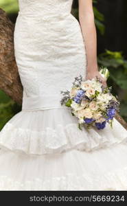 Wedding bouquet in bride&rsquo;s hand, closeup view&#xA;