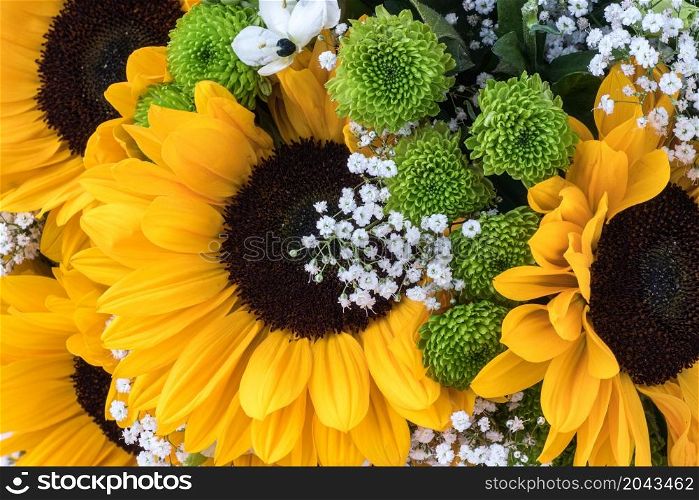 Wedding bouquet of sunflower. Natural floral background.