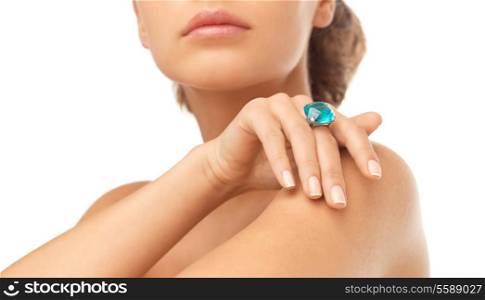 wedding, bridal jewelry and luxury concept - picture of beautiful woman with big blue cocktail ring