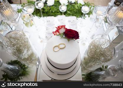 wedding cake on the bride's desk