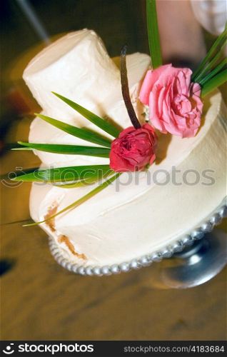 Wedding Cake with Roses and Palm Leaves
