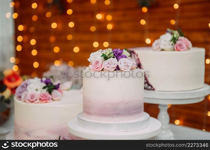 Wedding cakes before handing out to the newlyweds.. A cascade of cakes for a wedding 3891.