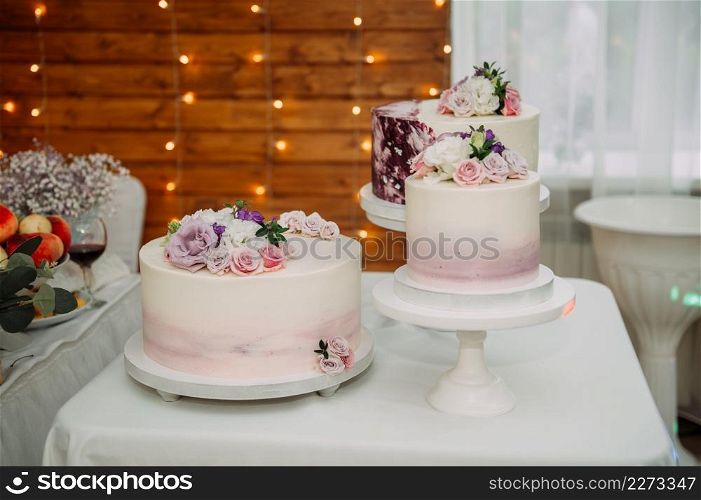 Wedding cakes before handing out to the newlyweds.. A cascade of cakes for a wedding 3892.