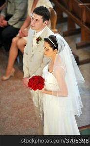 Wedding ceremonies in church. groom and bride
