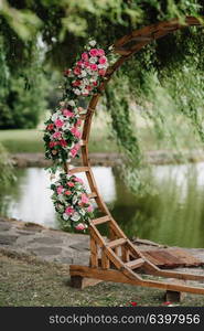 wedding ceremony area, arch chairs decor