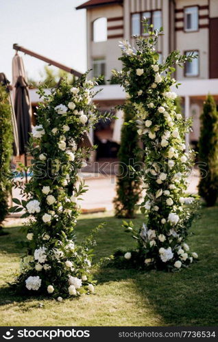 wedding ceremony area, arch chairs decor