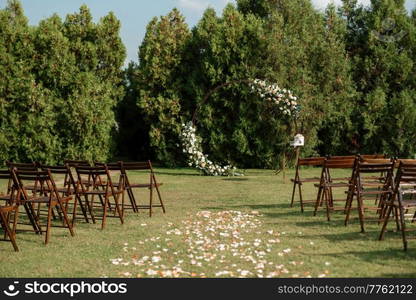 wedding ceremony area, arch chairs decor