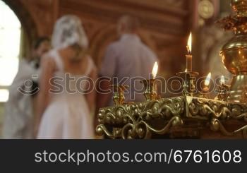 Wedding Ceremony in Russian Christian Orthodox Church Priest blesses the Newlyweds