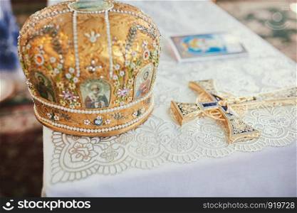 wedding ceremony in the Orthodox Church. holy water. Golden crown at the wedding ceremony.. wedding ceremony in the Orthodox Church. Golden crown at the wedding ceremony. holy water