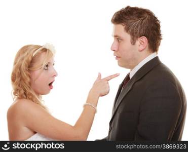 Wedding couple having argument - conflict, bad relationships. Angry woman fury bride and groom in fight. Isolated