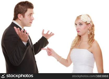 Wedding couple having argument - conflict, bad relationships. Angry woman fury bride and groom in fight. Isolated
