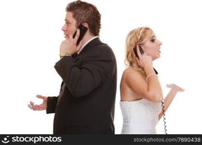 Wedding couple relationship difficulties. Unhappy woman man bride groom talking on phone having argument conflict. Isolated on white