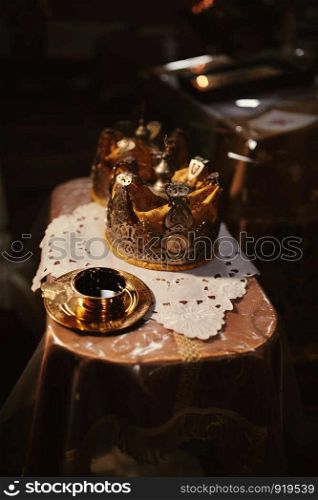 Wedding crowns. Wedding crown in church ready for marriage ceremony. close up.. Wedding crowns. Wedding crown in church ready for marriage ceremony. close up. Divine Liturgy.