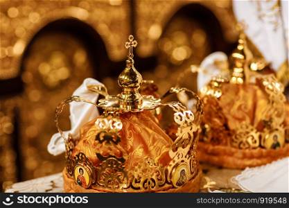 Wedding crowns. Wedding crown in church ready for marriage ceremony. close up.. Wedding crowns. Wedding crown in church ready for marriage ceremony. close up. Divine Liturgy.