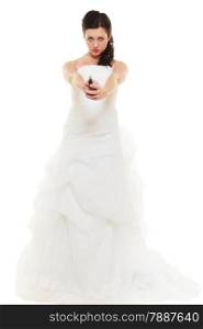Wedding Day. Angry betrayed bride concept. Woman in white dress with gun isolated on white. Studio shot.