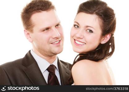 Wedding day. Portait of hugging bride woman girl in white dress and groom man in elegant suit. Married couple isolated on white. Love and affection.