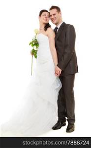 Wedding day. Portrait of romantic married couple. Full length studio shot white background.