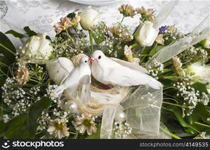 wedding decoration bouquet with two white doves. wedding decoration