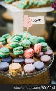 wedding dessert with delicious cakes and macaroons