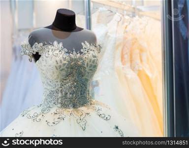 Wedding dress on mannequin in the shop. Wedding dress