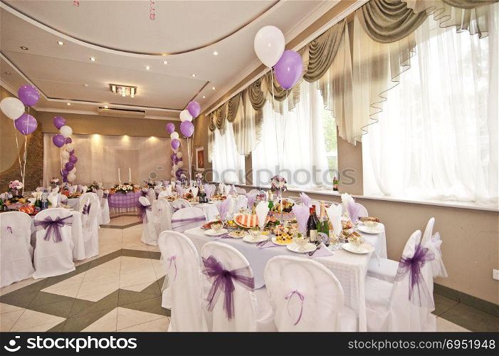 Wedding hall with spheres. It are white - violet registration of a hall.