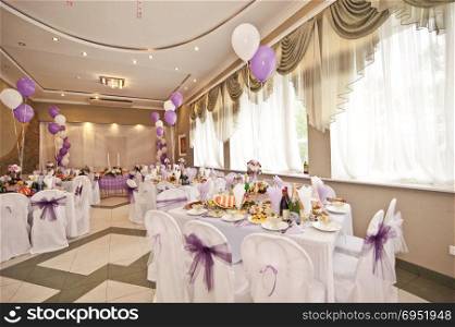 Wedding hall with spheres. It are white - violet registration of a hall.