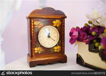 Wedding handmade decorations at restaurant with all beauty and flowers.. Wedding clock decorations at restaurant with all beauty and flowers
