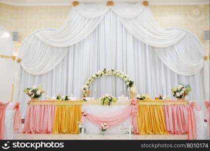 Wedding handmade decorations at restaurant with all beauty and flowers.. Wedding table decorations at restaurant with all beauty and flowers