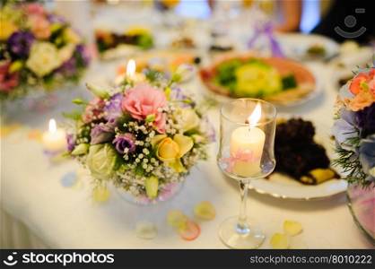 Wedding handmade decorations at restaurant with all beauty and flowers.. Wedding table decorations at restaurant with all beauty and flowers
