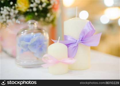 Wedding handmade decorations at restaurant with all beauty and flowers.. Wedding candle decorations at restaurant with all beauty and flowers